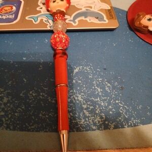 Red and Silver Decorative Pen